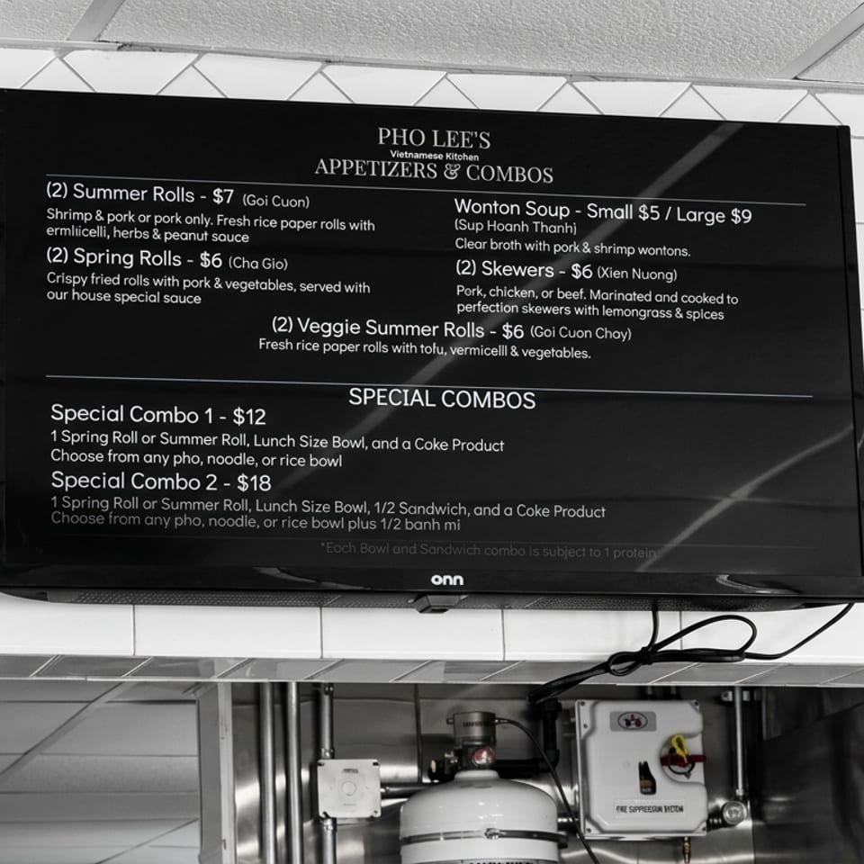 Digital menu at Pho Lee's Vietnamese Kitchen lists appetizers, spring rolls, summer rolls, skewers, wonton soup, and combo meals.